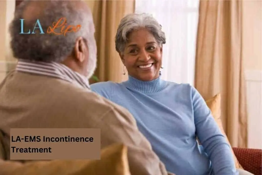 Couple sat smiling at each other - LA-EMS treatment Leyton