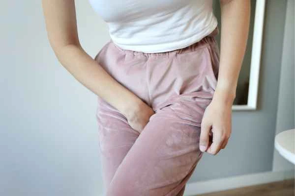 woman struggling with urine incontinence Leyton